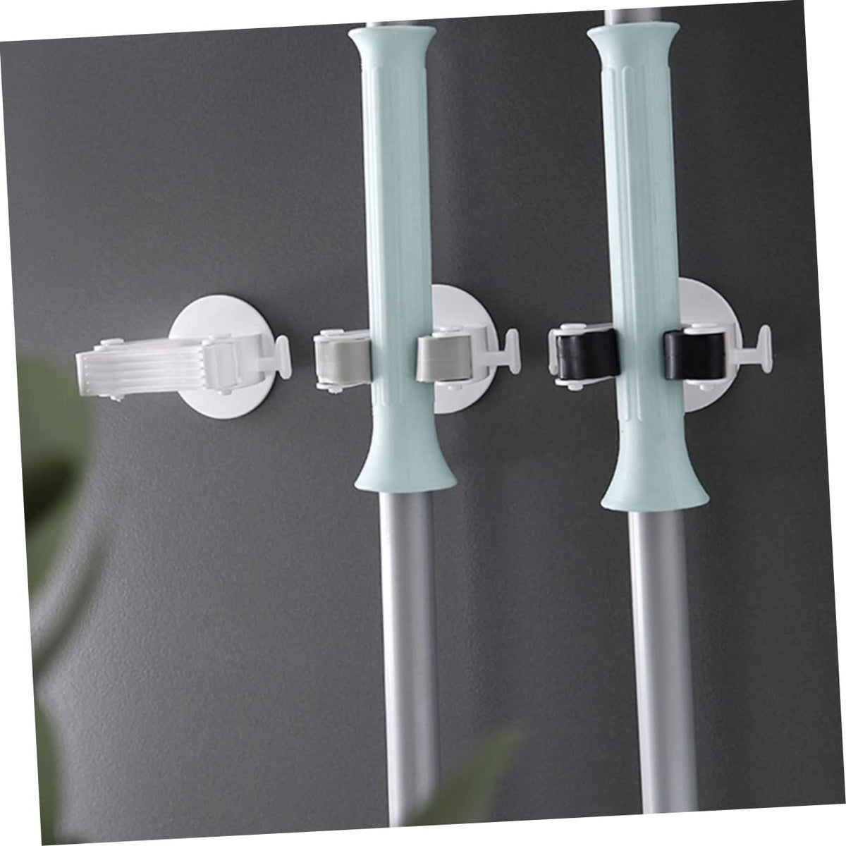 4Pcs Traceless Mop Holders Creative Wall Mount Mop Clips for Home Office and Bathroom Organization Stylish Design for Mop and Broom Storage Easy to Use and Install