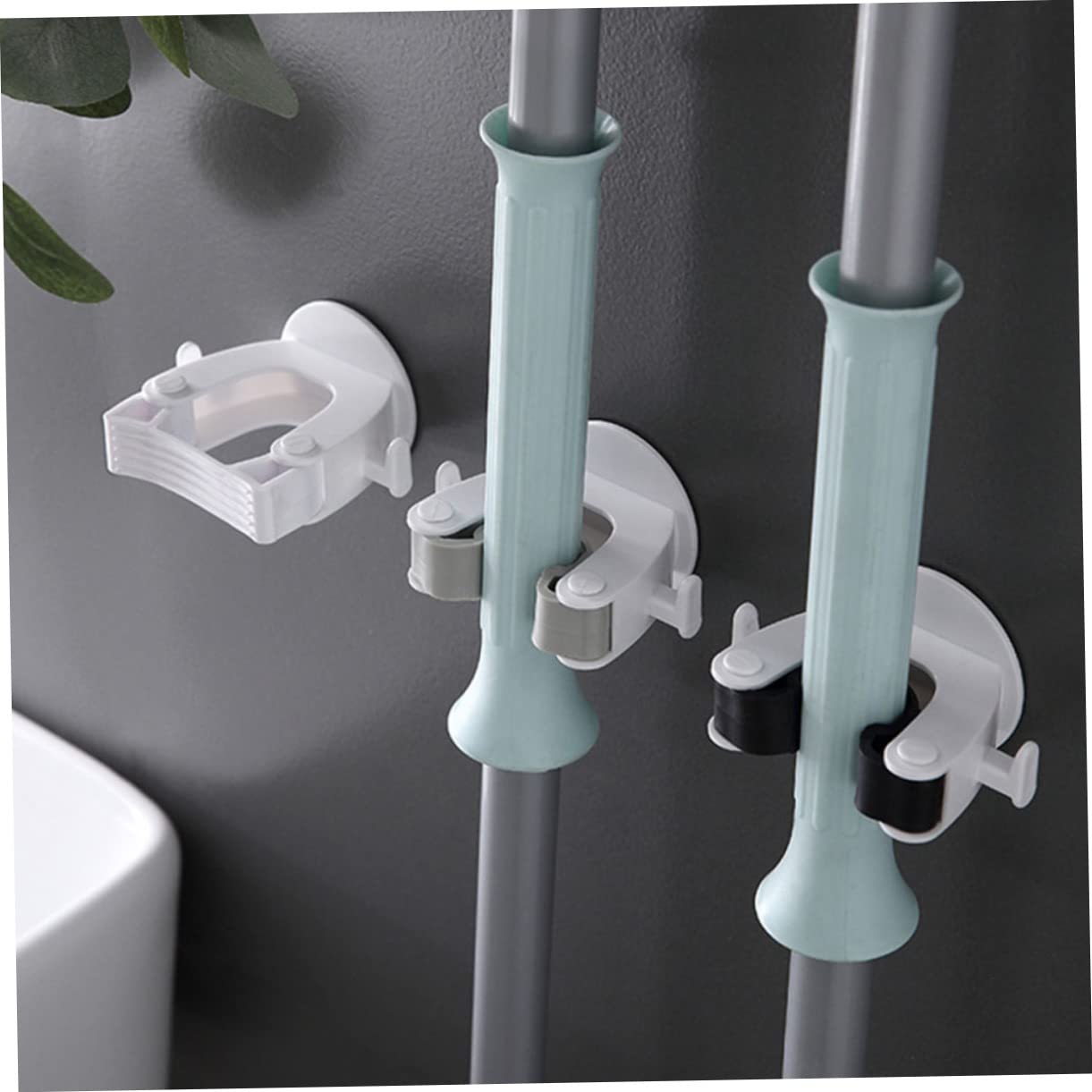4Pcs Traceless Mop Holders Creative Wall Mount Mop Clips for Home Office and Bathroom Organization Stylish Design for Mop and Broom Storage Easy to Use and Install