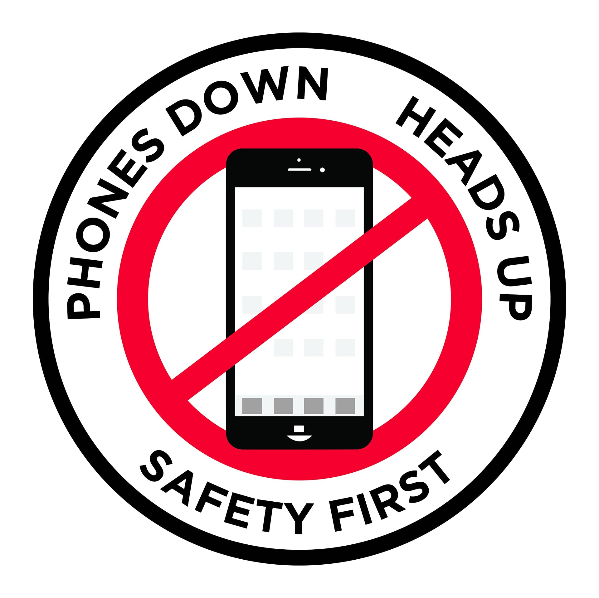 Phones Down Heads Up" Safety Sign